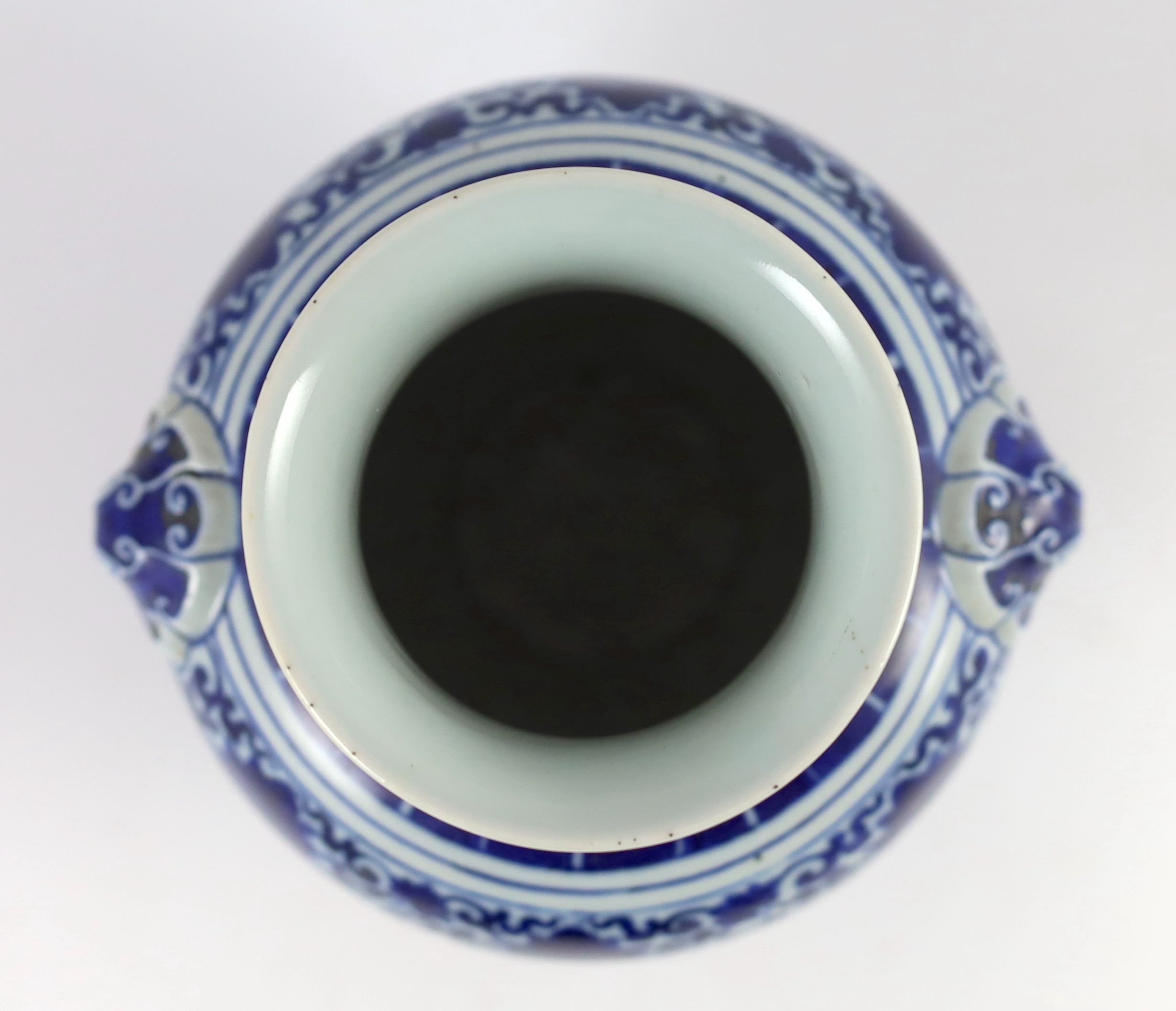 A Chinese archaistic blue and white vase, hu, Qianlong seal script mark but 19th century, 25cm high